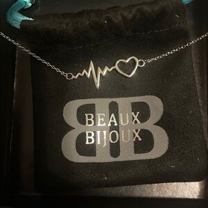 Silver heartbeat necklace